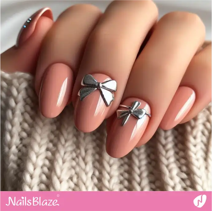 Silver Bow Charms on Peach Fuzz Nails | Color of the Year 2024 - NB1938